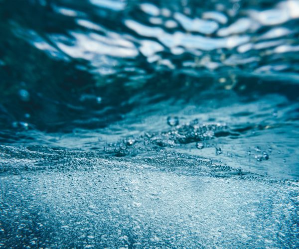 Underwater splash with bubbles.